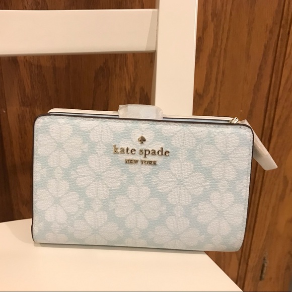 kate spade Handbags - Kate Spade Signature Flower Medium Compact Bifold Wallet